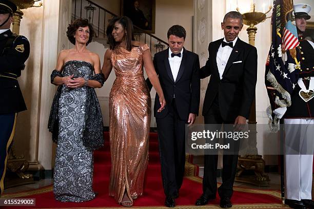 President Barack Obama and First Lady Michelle Obama pose for the official picture with Italian Prime Minister Matteo Renzi and Italian First Lady...