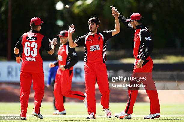 Cameron Valente of the Redbacks celebrates with team mates after taking the wicket of Beau Webster of the Tigers during the Matador BBQs One Day Cup...