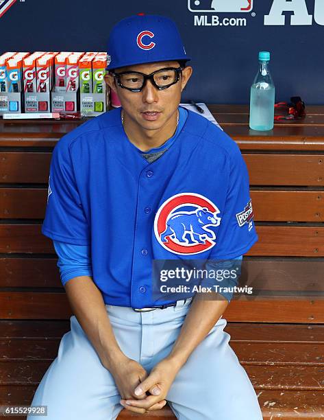 Munenori Kawasaki of the Chicago Cubs looks on from the dugout during Game 3 of the NLCS against the Los Angeles Dodgers at Dodger Stadium on...