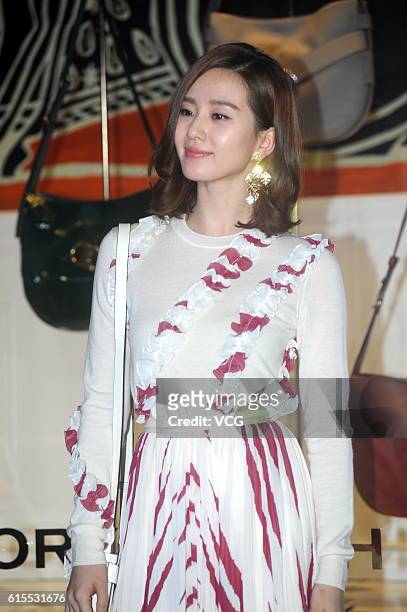 Actress Liu Shishi attends a commercial activity of Tory Burch on October 18, 2016 in Shanghai, China.