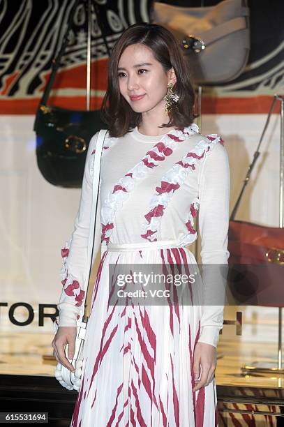 Actress Liu Shishi attends a commercial activity of Tory Burch on October 18, 2016 in Shanghai, China.