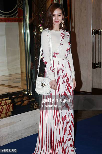 Actress Liu Shishi attends a commercial activity of Tory Burch on October 18, 2016 in Shanghai, China.