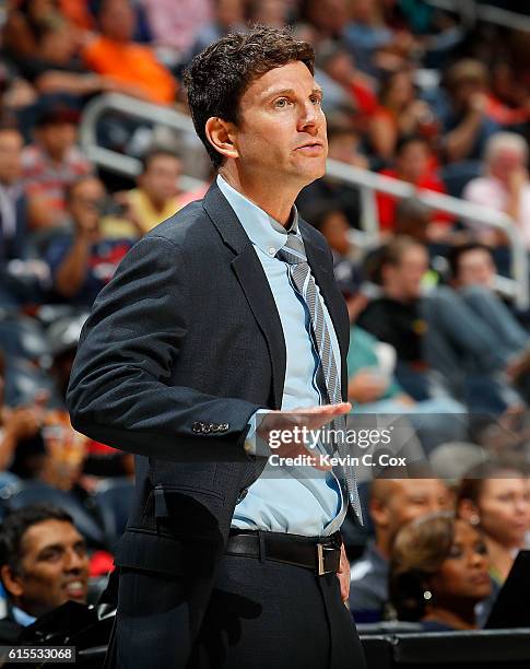 Associate head coach Darren Erman of the New Orleans Pelicans attempts to calm down his team during the game against the Atlanta Hawks at Philips...