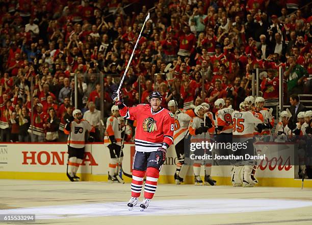 Marian Hossa of the Chicago Blackhawks acknowleges the crowd after scoring his 500th career goal in the second period against the Philadelphia Flyers...