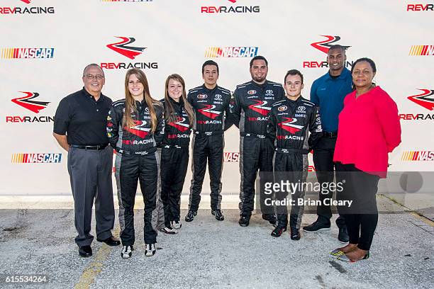 Drive for Diversity Developmental Program drivers pose for a group photo with NASCAR officials at New Smyrna Speedway on October 18, 2016 in New...