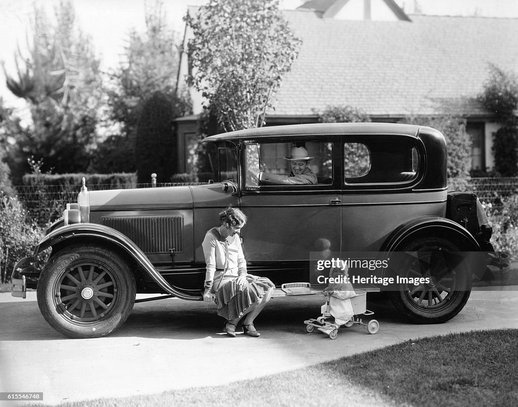 Stan Laurel at the wheel of 1927 Hupmobile with his wife Lois and daughter Lois