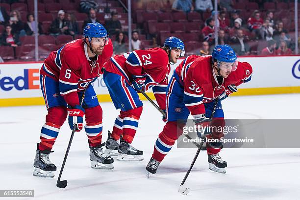 Montreal Canadiens Defenceman Shea Weber Montreal Canadiens Left Wing Phillip Danault and Montreal Canadiens Winger Brian Flynn at faceoff during the...
