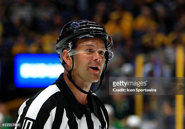 Referee Kyle Rehman is shown during the NHL game between the Nashville Predators and the Dallas Stars, held at Bridgestone Arena in Nashville,...