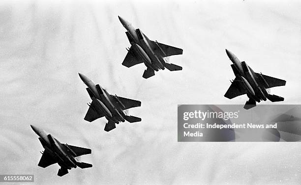 Eagles, USAF Jets, giving a performance at the Air Spectacular in Fairyhouse, Meath, as spectators below follow their flight, .