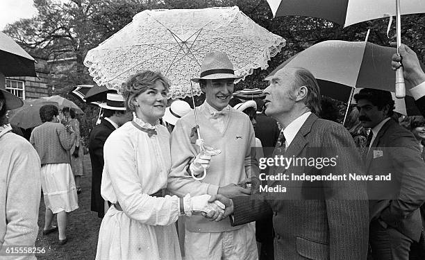 President Patrick Hillery is greeeted to the Edwardian Tea Party at Trinity College in Dublin by Carolyn Earls and David Duffy, .