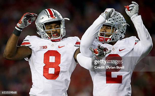 Gareon Conley and Marshon Lattimore of the Ohio State Buckeyes celebrate after Conley made an interception in the third quarter against the Wisconsin...