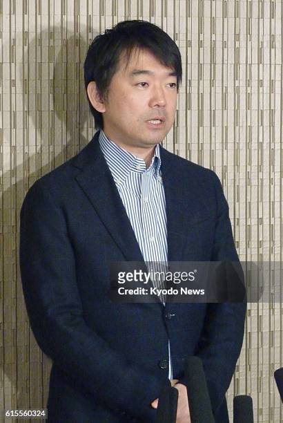 Japan - Osaka Mayor Toru Hashimoto answers reporters' questions at the Osaka City Hall on Nov. 14, 2012. The same day, Hiroshima Mayor Kazumi Matsui...