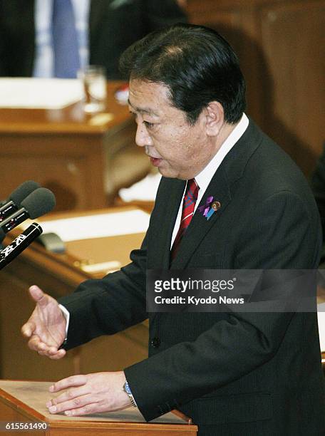 Japan - Photo shows Japanese Prime Minister Yoshihiko Noda during a one-on-one party leaders' debate with Shinzo Abe, president of the main...