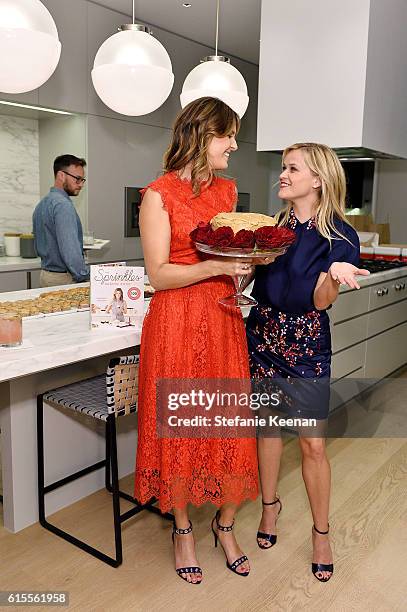 Reese Witherspoon and Candace Nelson attend The Sprinkles Baking Book by Candace Nelson: Pre-Release Party on October 18, 2016 in Beverly Hills,...