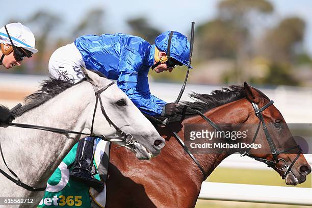 Jockey Kerrin McEvoy riding Qewy beats Katelyn Mallyon riding Grey Lion to win race 7 the Bet365 Geelong Cup during the 2016 Geelong Cup at the...