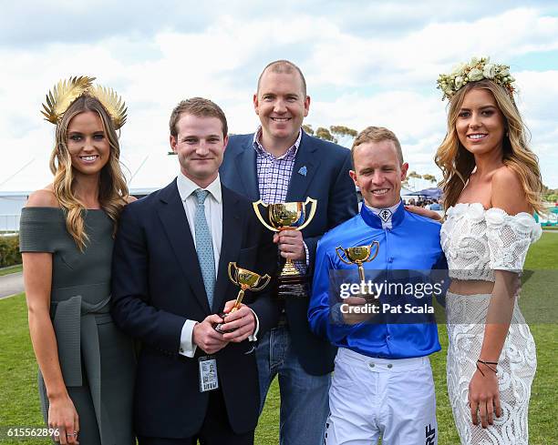 Andy Makiv from Godolphin, assistant trainer James Ferguson and Kerrin McEvoy with Lucy and Ruby Brownless after Qewy won bet365 Geelong Cup at...