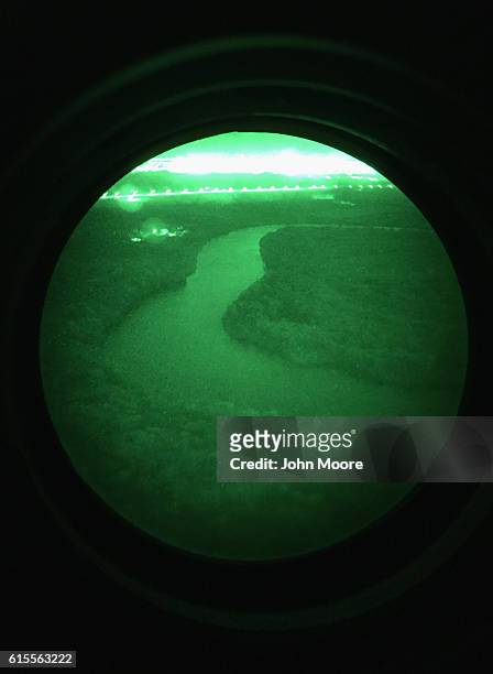 The Rio Grande flows along the U.S.-Mexico border, as seen from a U.S. Customs and Border Protection helicopter during a patrol over the U.S.-Mexico...