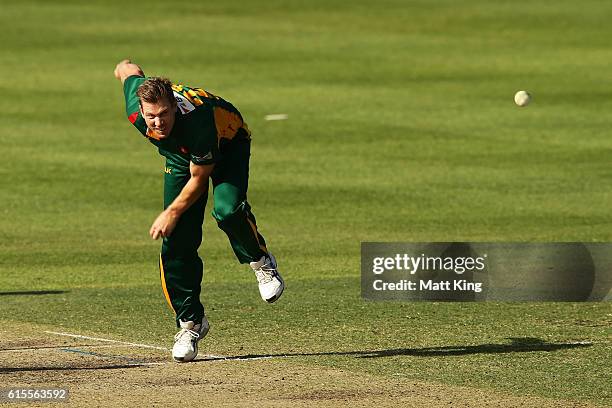 James Faulkner of the Tigers bowls during the Matador BBQs One Day Cup match between South Australia and Tasmania at Hurstville Oval on October 19,...