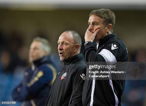 Bolton Wanderers manager Phil Parkinson watches on anxiously as Millwall press in the 2nd half during the Sky Bet League One match between Millwall...