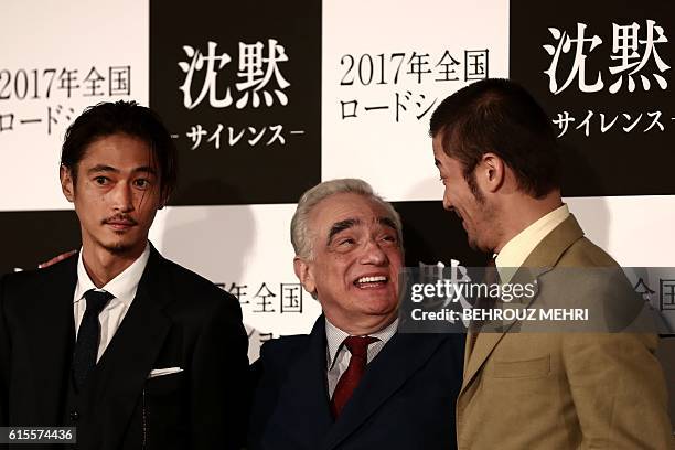 Director Martin Scorsese and Japanese actors Yosuke Kubozuka and Tadanobu Asano pose for a picture after a press conference for his latest movie...