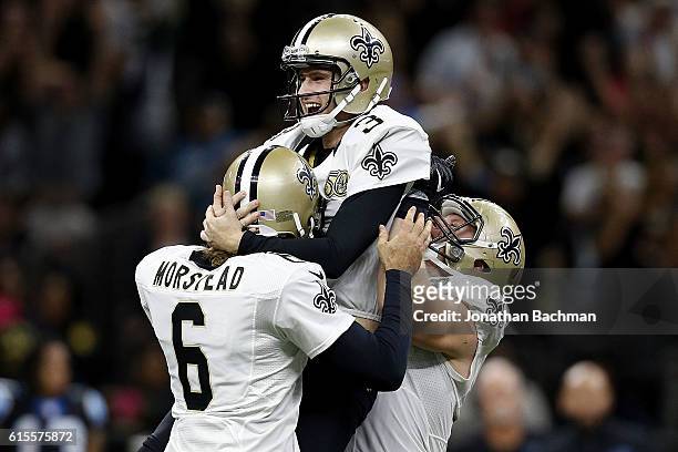 Wil Lutz of the New Orleans Saints celebrates after kicking the game winning field goal during the second half of a game against the Carolina...