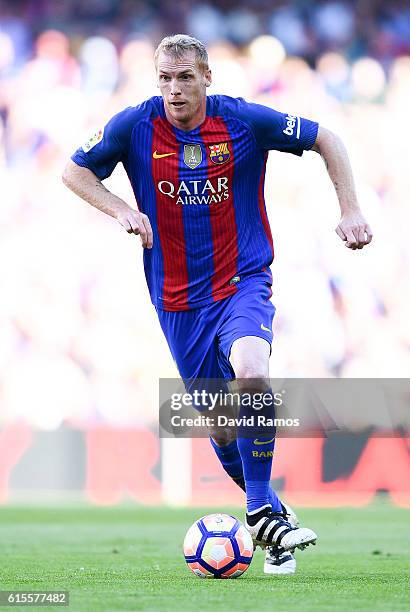 Jeremy Mathieu of FC Barcelona runs with the ball during the La Liga match between FC Barcelona and RC Deportivo La Coruna at Camp Nou stadium on...