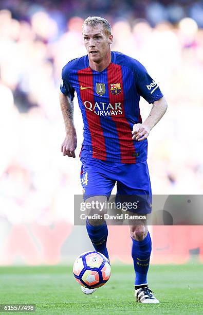 Jeremy Mathieu of FC Barcelona runs with the ball during the La Liga match between FC Barcelona and RC Deportivo La Coruna at Camp Nou stadium on...