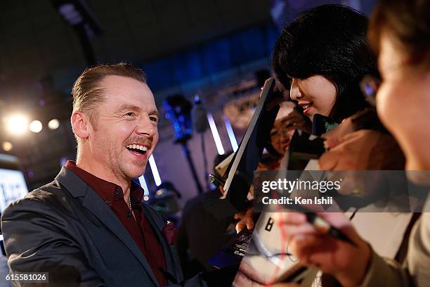 Simon Pegg signs autographs for fans at the premiere of Paramount Pictures' "Star Trek Beyond" at TOHO Cinemas on October 19, 2016 in Tokyo, Japan.