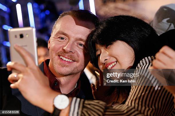 Simon Pegg takes photographs with fans at the premiere of Paramount Pictures' "Star Trek Beyond" at TOHO Cinemas on October 19, 2016 in Tokyo, Japan.