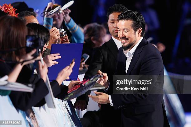 Justin Lin signs autographs for fans at the premiere of Paramount Pictures' "Star Trek Beyond" at TOHO Cinemas on October 19, 2016 in Tokyo, Japan.