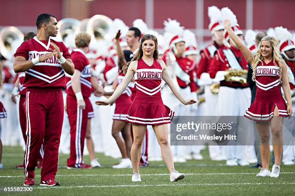 Arkansas Razorbacks Cheer Cheerleaders of the Arkansas Razorbacks prepare to run onto the field ...