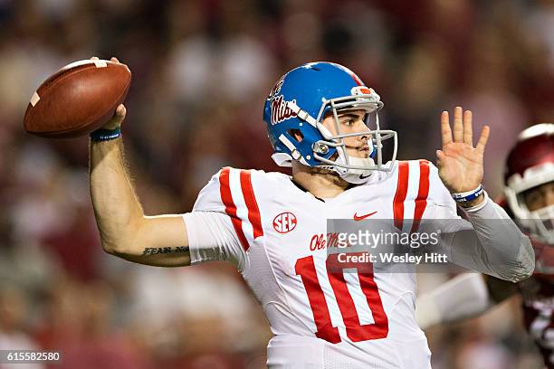Chad Kelly of the Mississippi Rebels throws a pass during a game against the Arkansas Razorbacks at Razorback Stadium on October 15, 2016 in...