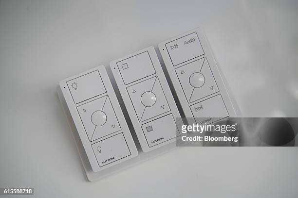Lutron Electronics Co. Pico remote wireless controllers sit on display inside a home at the Lennar Corp. Marina Shores development in Alameda,...