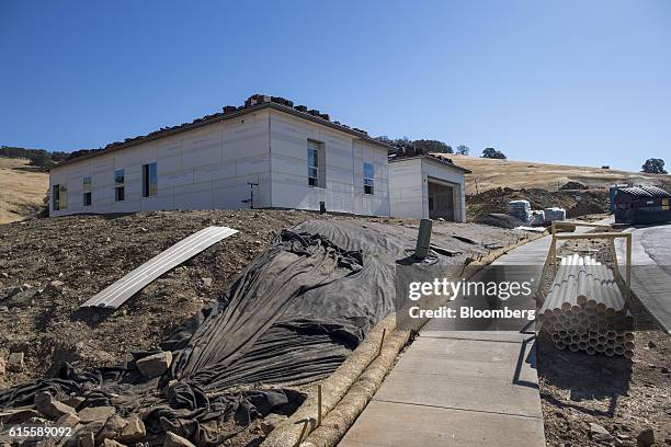 Home under construction stands at the Lennar Corp. Enclave development in El Dorado Hills, California, U.S., on Tuesday, Sept. 27, 2016. Consumers...