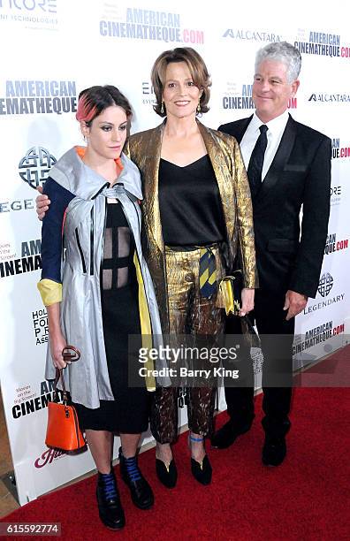 Actress Charlotte Simpson, actress Sigourney Weaver and Jim Simpson attend the 30th Annual American Cinematheque Awards Gala at The Beverly Hilton...