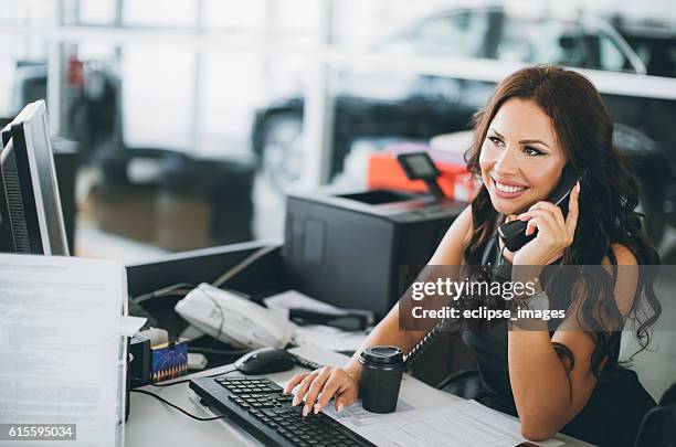 secretary at car dealership - car dealership phone stock pictures, royalty-free photos & images