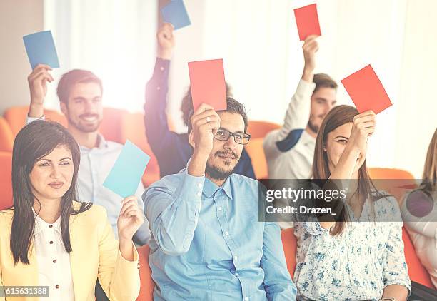 vintage image of people voting in local community - conservative politics stock pictures, royalty-free photos & images