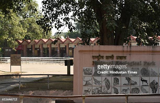 The closed entry gates of the National Zoological Park as Delhi Zoo has been temporarily shut after the death of nine birds, on October 19, 2016 in...