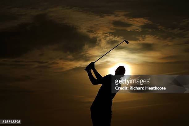 Thomas Pieters of Belgium hits a shot on the driving range after the pro-am for the Portugal Masters at the Oceanico Victoria Golf Club on October...