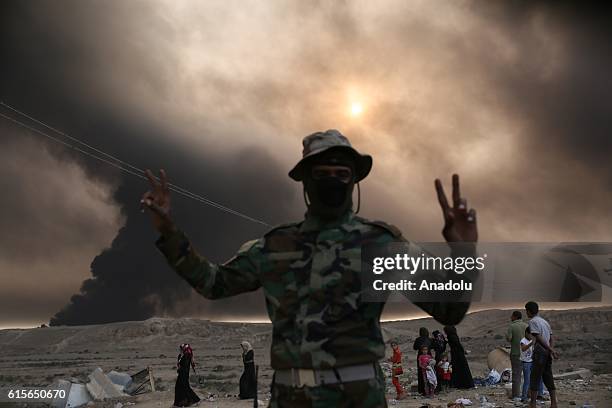 Iraqi army forces take position in Hut village after retaking the village from Daesh terrorists following Iraqi army's retaking of Al Qayyarah town...