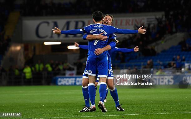 Cardiff player Peter Whittingham is congratulated by Rickie Lambert after scoring the opening goal from a free kick during the Sky Bet Championship...