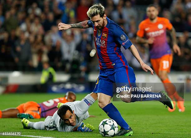 Barcelona's Argentinian forward Lionel Messi shoots to score a goal beside Manchester City's Chilean goalkeeper Claudio Bravo during the UEFA...