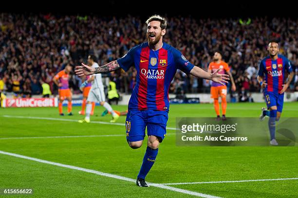 Lionel Messi of FC Barcelona celebrates after scoring the opening goal during the UEFA Champions League group C match between FC Barcelona and...