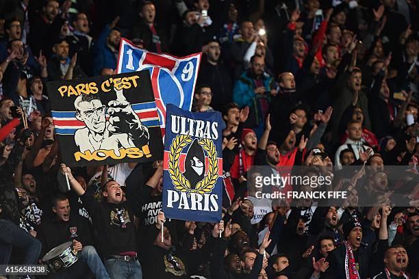Paris Saint-Germain's ultras cheer during the UEFA Champions League group A football match between Paris Saint-Germain and Basel at the Parc des...