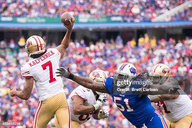 Brandon Spikes of the Buffalo Bills dives towards a passing Colin Kaepernick of the San Francisco 49ers on October 16, 2016 at New Era Field in...