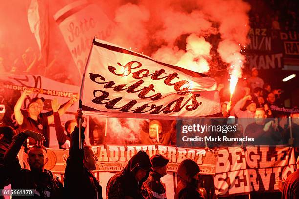 Borussia Moenchengladbach fans use flares during the UEFA Champions League group C match between Celtic FC and VfL Borussia Moenchengladbach at...