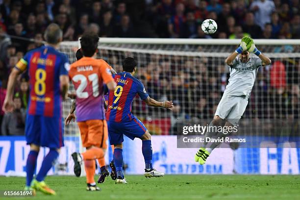 Claudio Bravo of Manchester City handles the shot from Luis Suarez of Barcelona outside of his area during the UEFA Champions League group C match...
