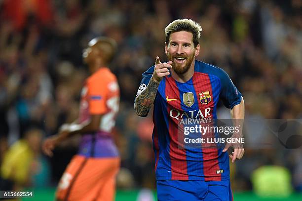 Barcelona's Argentinian forward Lionel Messi celebrates a goal during the UEFA Champions League football match FC Barcelona vs Manchester City at the...