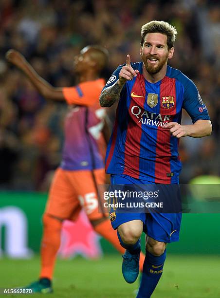 Barcelona's Argentinian forward Lionel Messi celebrates a goal during the UEFA Champions League football match FC Barcelona vs Manchester City at the...