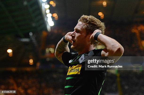 Andre Hahn of Borussia Moenchengladbach celebrates after scoring his team's second goal of the game during the UEFA Champions League group C match...